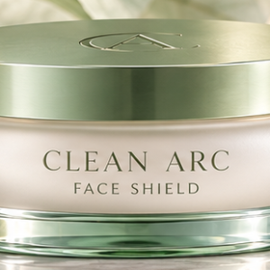 Face Shield signature low-profile ivory jar with Glacier Jade Light lid.